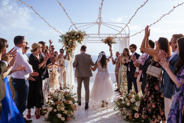 Read more about the article Wedding Photographer in Santorini: How to Avoid Boring Photos (and Awkward Poses)