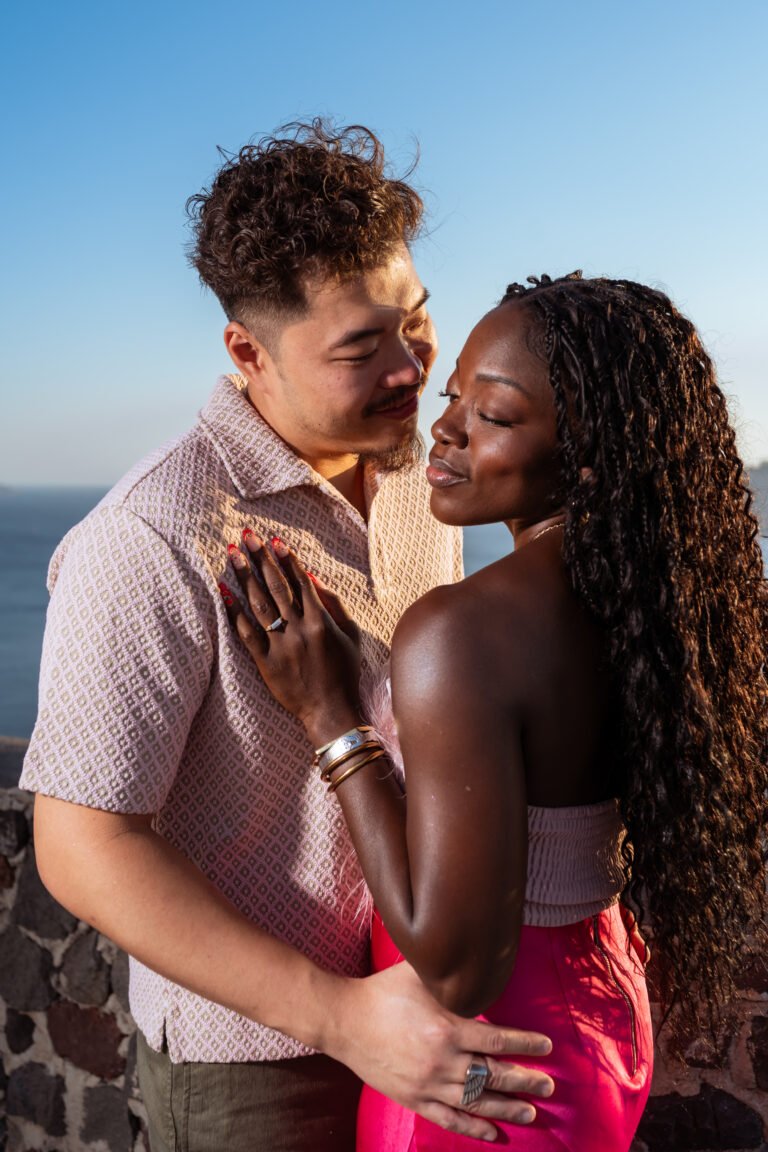 red sand beach Santorini photoshoot